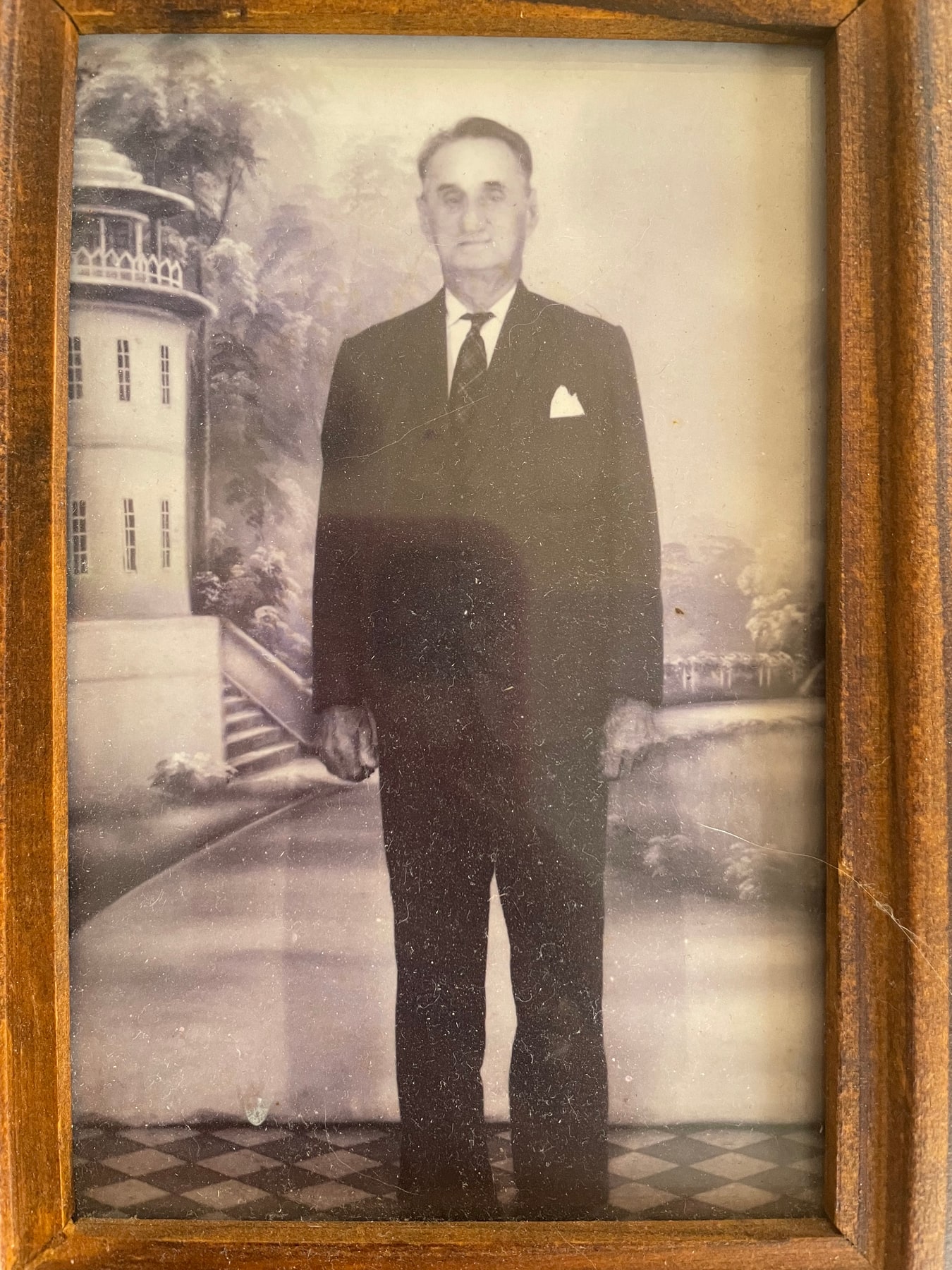 Framed historical portrait of Joseph Rosse in a dark suit